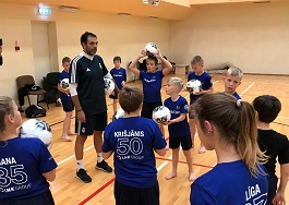 An international sports camp in Riga gathers more than 100 children from all over Latvia, including children from orphanages and children with special needs. 